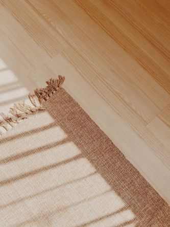 area rug on hardwood floors